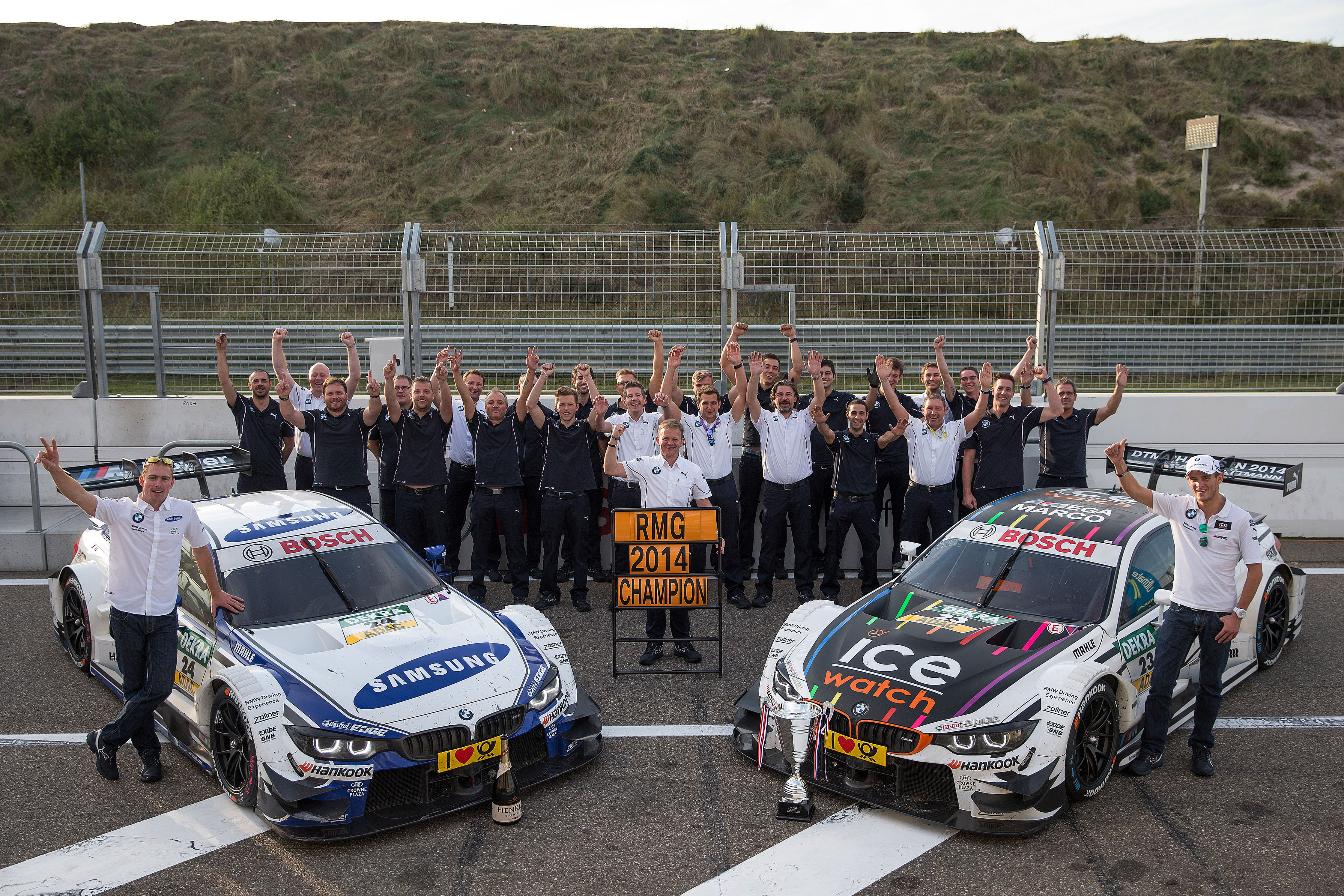 Zandvoort (NL) 28th September 2014. BMW Motorsport, Maxime Martin (BE), Stefan Reinhold (DE) Team Principal, Marco Wittmann (DE) and BMW Team RMG, BMW Team Champion. This image is copyright free for editorial use © BMW AG (09/2014).