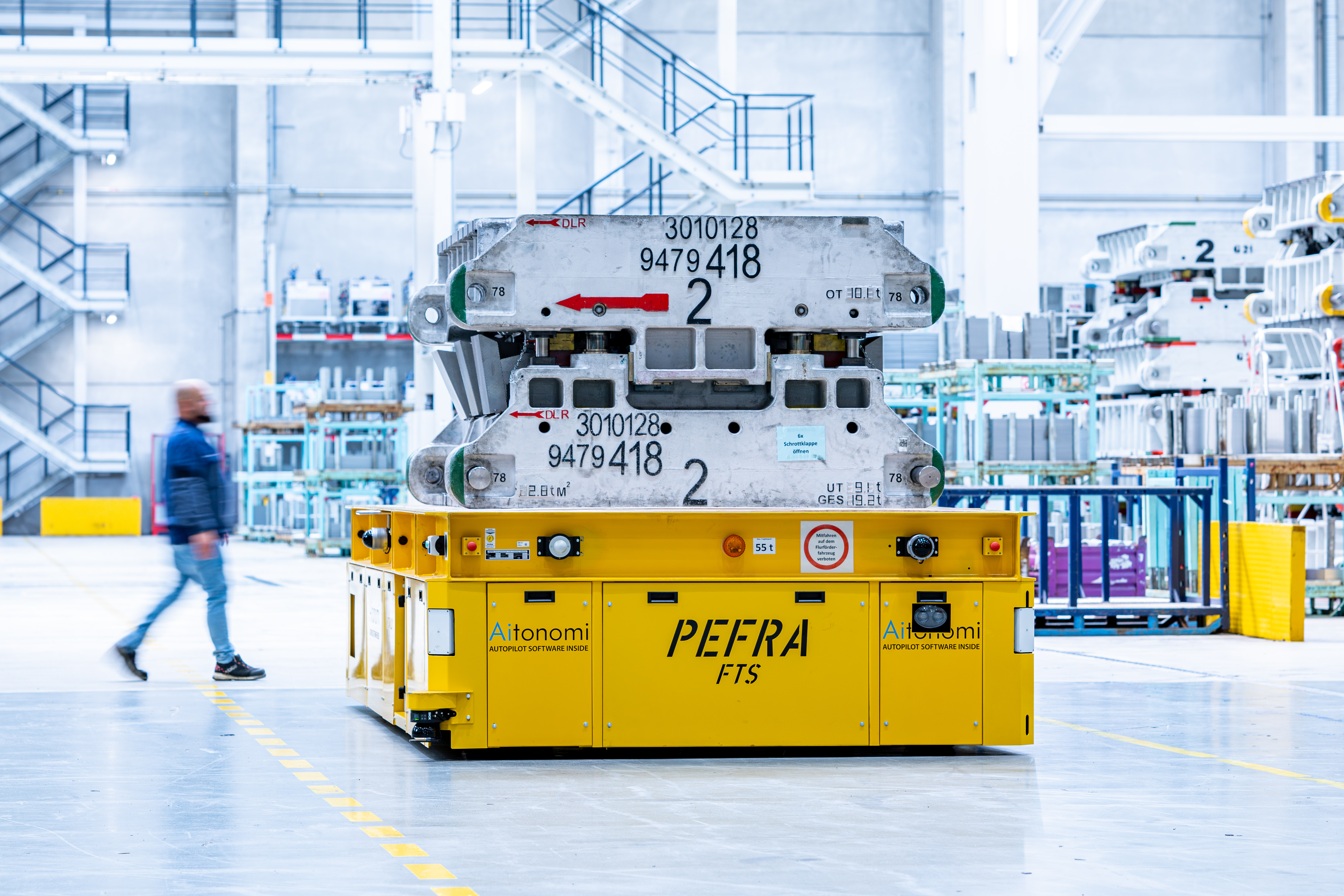 BMW Group Plant Regensburg press shop: autonomous, driverless transport vehicle navigates precisely through press shop (06/2024)